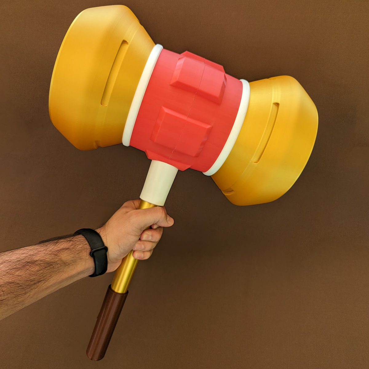 Colorful 3D printed cosplay hammer from the 3D2designs shop